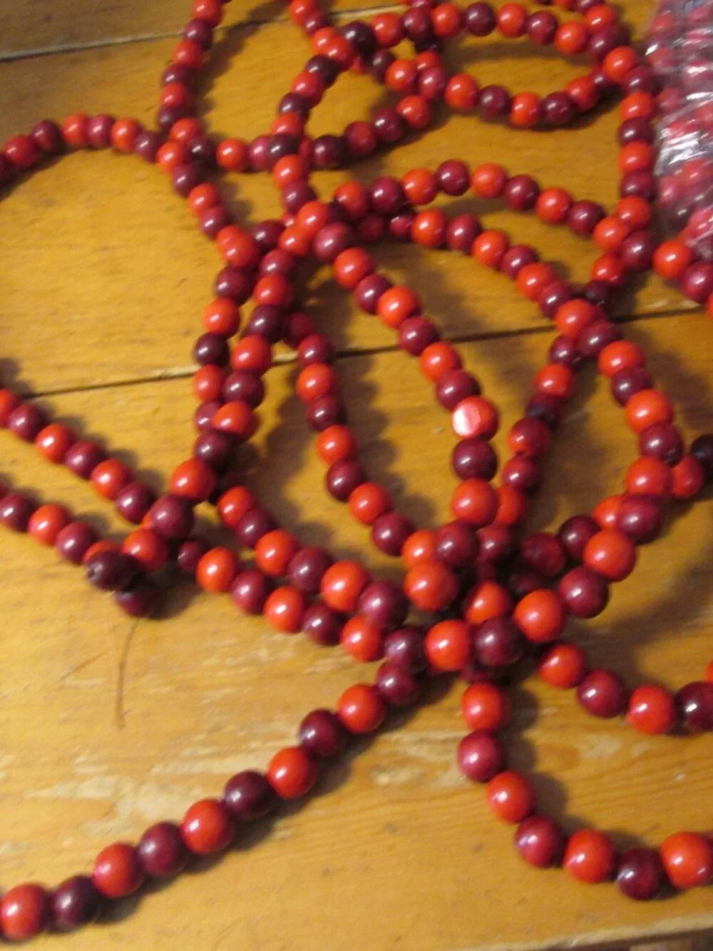 3 strands of cranberry wooded beads vtg 80s 105 in each strand for the tree